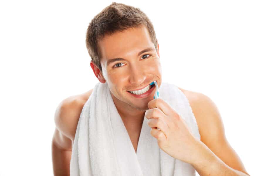 Man brushing teeth in Rapid City, SD
