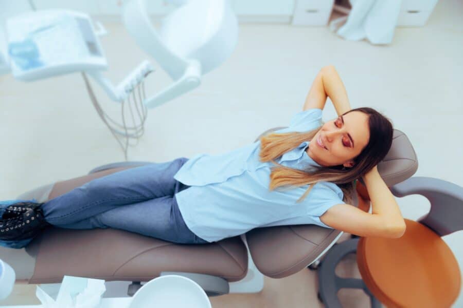 Woman relaxing at dental appointment in Rapid City, SD